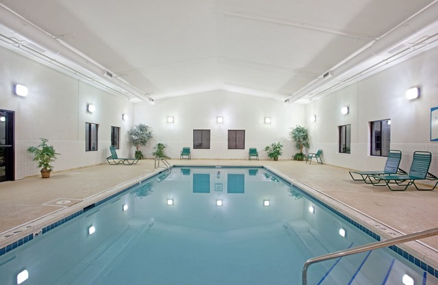 Business District Suite with Pool Access, Free Breakfast + Weekday Shuttle