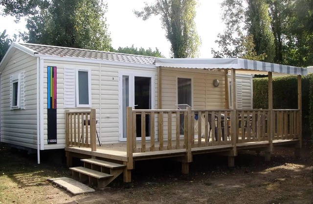 Campsite LE PANORAMIC * - MOBILE HOME NIRVANA 31 M2 with covered terrace 4 people