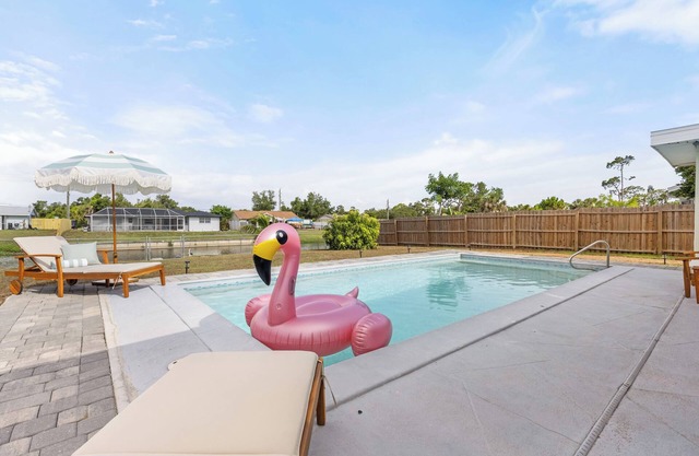 Canal-Front 3BD - Coastal Vibes, Pool & Near Beach