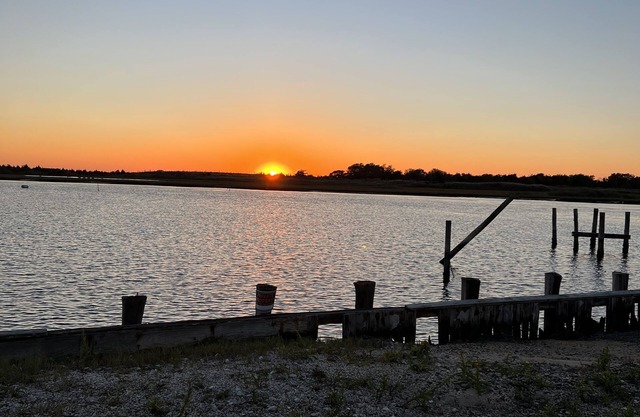 Centrally located, modern, beautiful home on the bay with wonderful views.