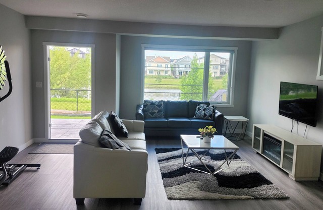 Charming 1-bedroom walkout pond backing suite with fitness machine, AC and bbq