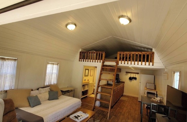 Charming 2-bedroom tiny house is a welcoming space for up to 4 guests and pups
