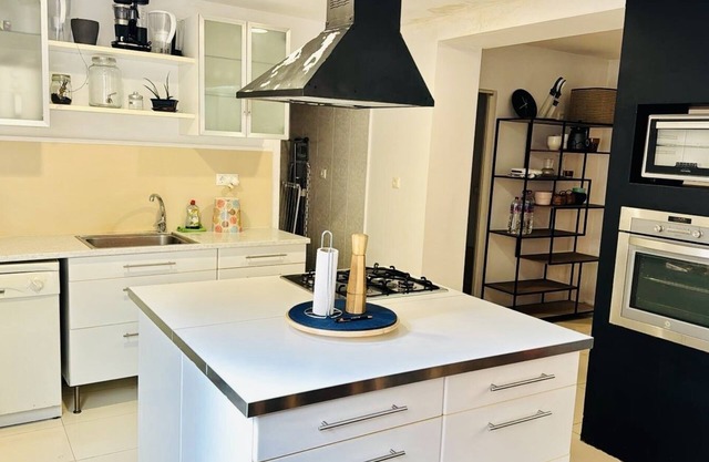 Charming 2BR/2BA Apartment Steps from the Beach - Hot Tub & Prime Location!