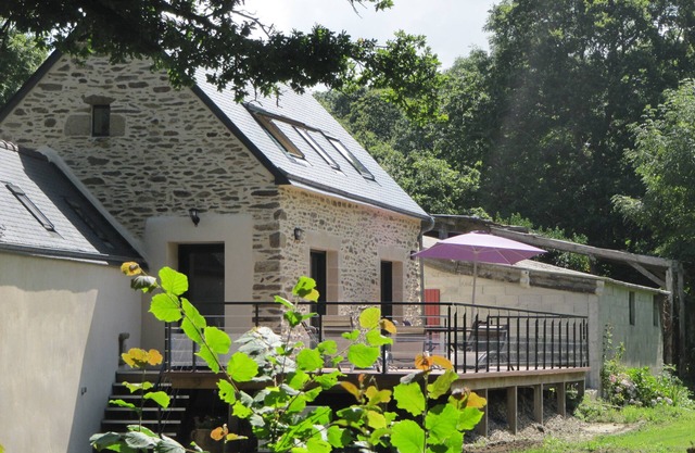 Charming cottage in the framework of an old mill in the countryside