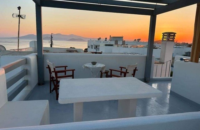 Charming Greek Apartment – Relax on the Rooftop with Sea View, 60m to the beach