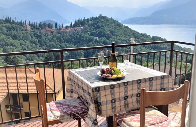 Charming Perledo Retreat with Lake View, Balcony & Parking