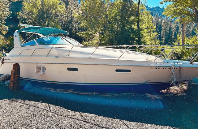 Charming Yacht docked on the Little Salmon River Near Riggins