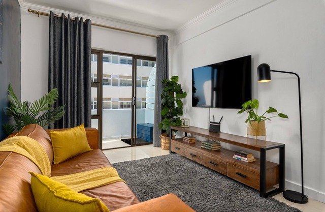 Chic Beachfront Oasis - Balcony - Netflix