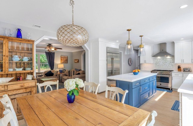Coastal-style home with open-floor plan, ample natural light, blocks away.