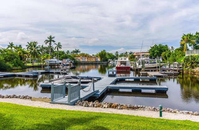 Condo with Boat Dock, 1.5 miles to beach, and 2 blocks to 5th Avenue!