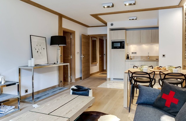 Contemporary 2BR Apartment with Balcony, Fitness Access, and Parking in Central Courchevel