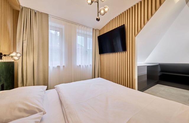 Cosy apartment for 5 guests with WIFI, TV, terrace, pets allowed and parking