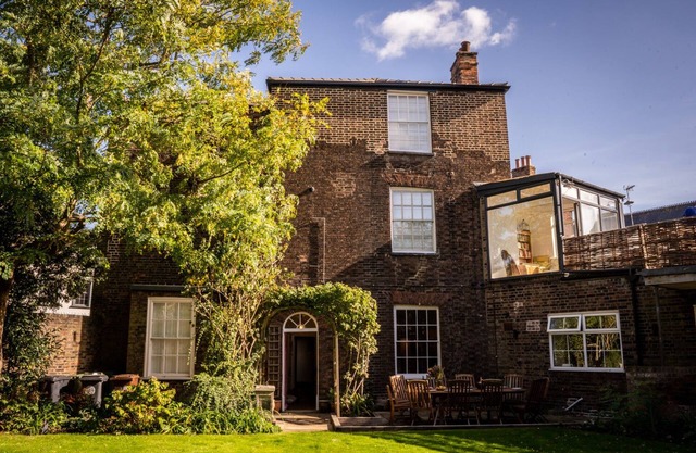 Country House with walled garden in center of town