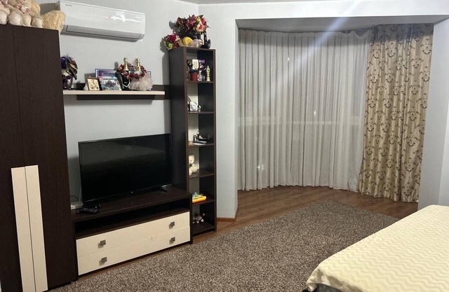 Cozy 1-bedroom apartment in delightful Chișinău with AC, WiFi