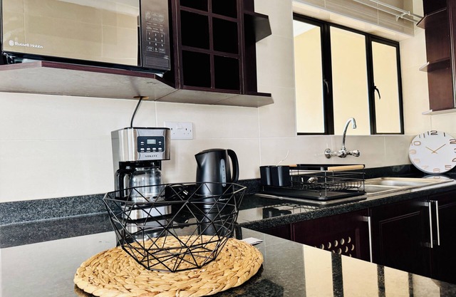 Cozy 2-bedroom apartment in the busy city of Gaborone with WiFi and A/C