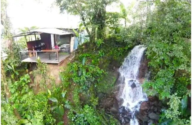 Cozy cabana with waterfall view