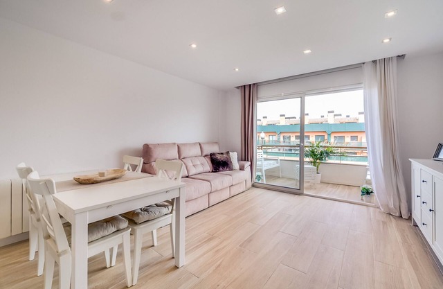 Cozy duplex for 4 people, free wifi and air conditioning next to the bedrooms. Vivalidays Elisabet community pool and garden