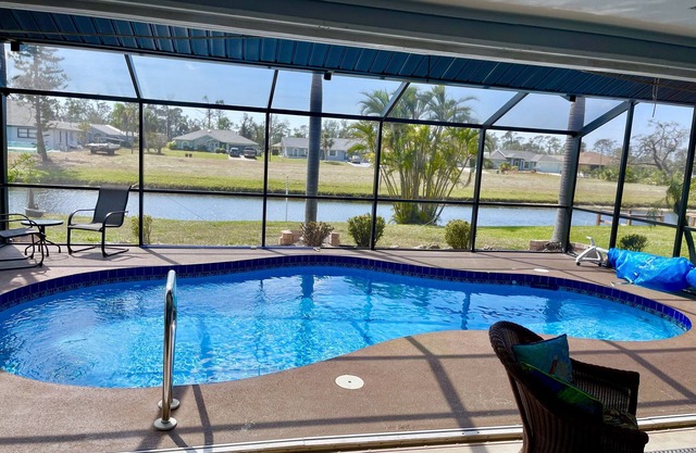 cute house with pool with canal view