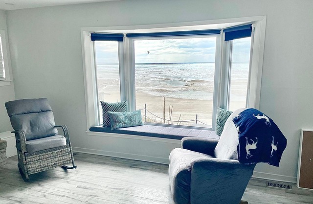 Direct beachfront home with stairs to private beach!