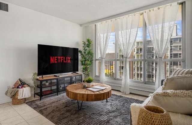 Downtown Near Rogers Place with Covered Parking, Sleeps 6, Pool Table, Sauna, Gym, Two Bedrooms & More