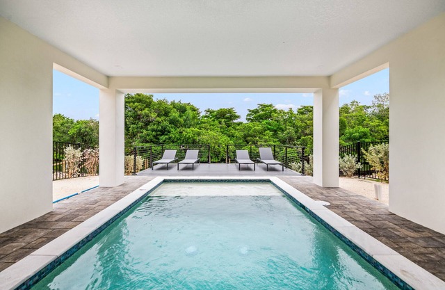 Eco-Luxury Canalfront Home with Pool and Dock near Anna Maria Island