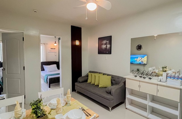 Emerald 2 bedroom apartment with a pool, gym, and a balcony with a view