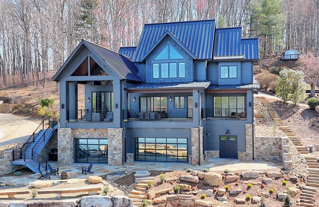 Endless Sunsets By Chatuge Home Concierge private boat dock with covered boat slip and sun deck, bar, fire pit, pool table, kayaks