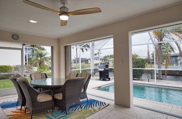Enjoy a tranquil vacation on expansive canal with passing boats and heated pool.