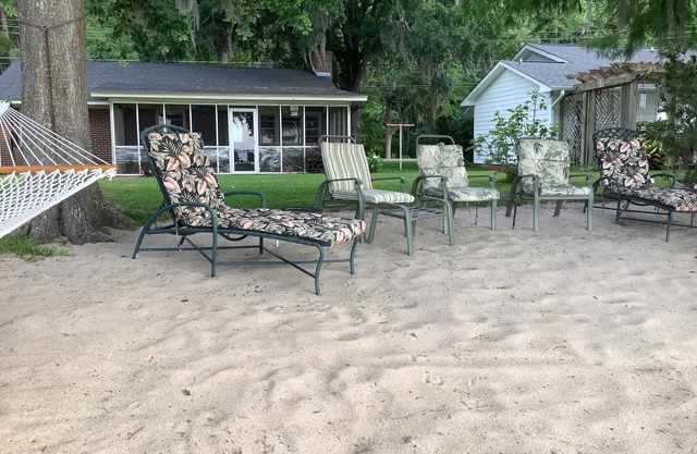Enjoy Lake Waccamaw in a cozy cottage steps from the lake.