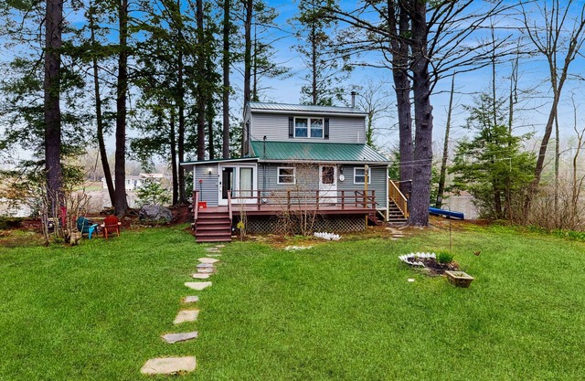 Entire lakefront home on Togus Pond with decks, canoe, firepit & great view
