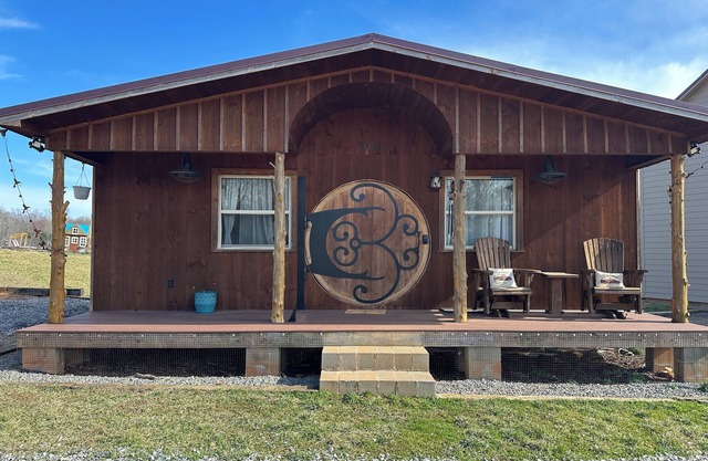 Escape to a Hobbit cottage overlooking a pond with water wheel in wine country!