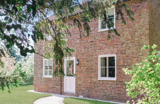 Escape to Gardeners Cottage, a tranquil retreat on the Saltmarshe Hall Estate.