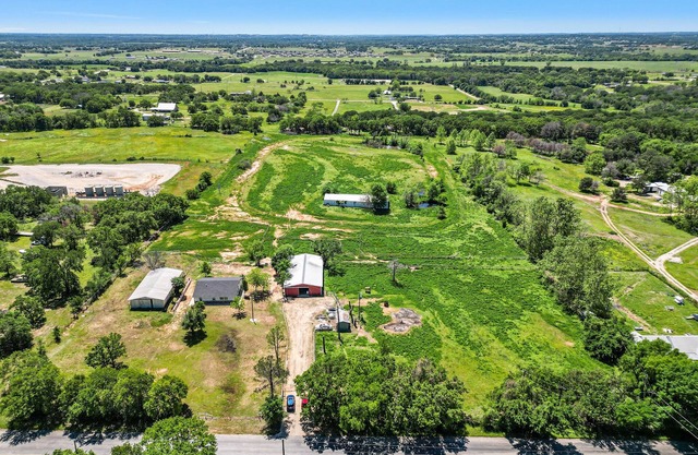 Escape to our charming ranch home on a peaceful 13-acre horse property.