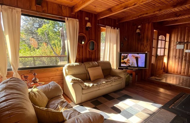 Escape to Our Cosy Wooden Cabin on Lake Calafquén: Your Perfect Staycation