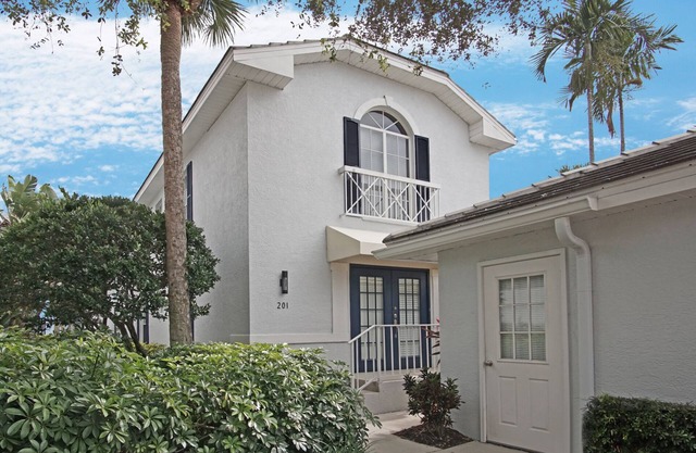 Exclusive Pelican Bay, 2 BR + Den with Garage, 2nd Floor Unit in Barrington Club