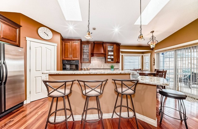 Executive house W secluded beach on lake Chestermere