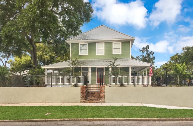 Experience the Captain's Quarters. A Historic 1920 American Four Square.