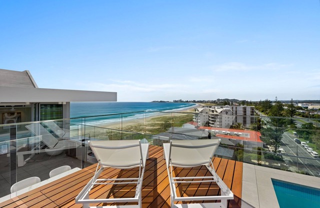 Experience the epitome of coastal luxury in this stunning apartment!