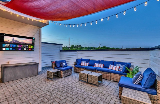 Fall rooftop with fire pit, game room, chef’s kitchen near Nissan Stadium
