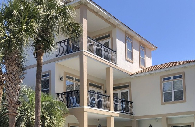 Family sized vacation home with heated private pool! 1 minute walk to the beach!