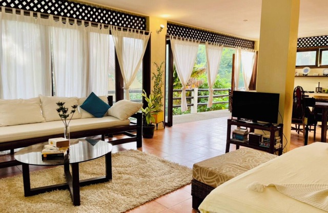 Family Studio with panoramic windows to tropical greenery. 3 min to the beach