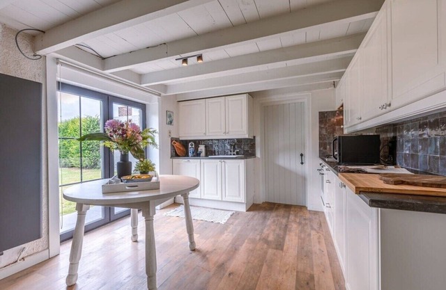 Farmhouse with garden and picturesque surroundings
