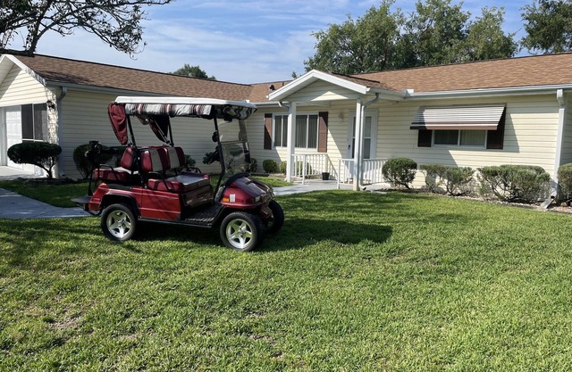 Golf cart access to the villages from the community of Spruce Creek.
