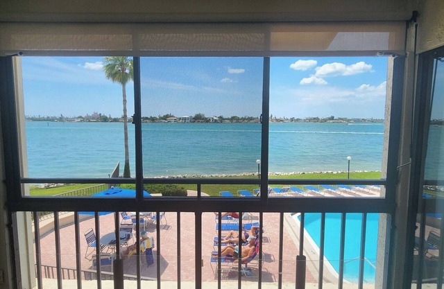 Gorgeous Second Floor Waterfront Villa with Sunset views over Boca Ciega Bay!