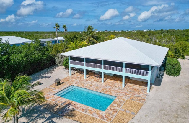 Hellenga Haven | Amazing 3 bed/3 bath waterfront retreat with pool & dockage on Big Pine Key