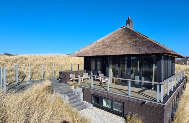 Hestia, a spacious villa in the dunes with jacuzzi and sauna near the village Nes.