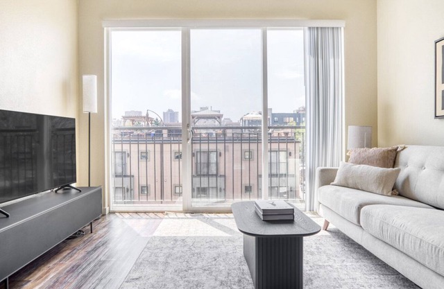 Hip Uptown 1BR w/ W/D & Juliette balconies, near Zoo, by Blueground