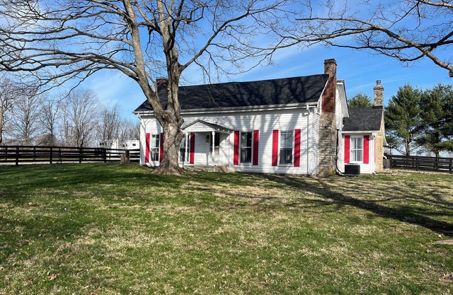 Historic circa 1790 2 bedroom farmhouse on 6 acres in beautiful Paris, Kentucky.