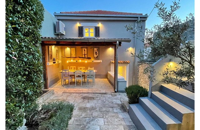 Historic Ensemble of two houses, garden, courtyard and parking