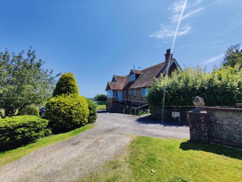 Historic river side cottage - top apartment